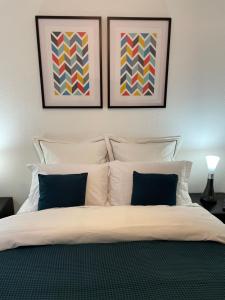 Postel nebo postele na pokoji v ubytování Appartement calme avec balcon, à 4km du centre, Parking, WI-FI, Netflix gratuit