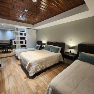 Katil atau katil-katil dalam bilik di Nomades Apartamentos