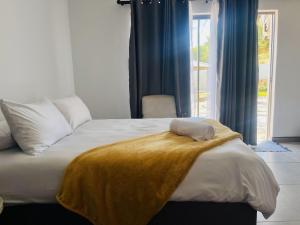TrendyBliss Guest House客房内的一张或多张床位