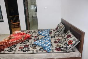 Uma cama ou camas num quarto em Gir Enjoy Forest Resort