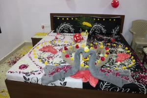 Uma cama ou camas num quarto em Gir Enjoy Forest Resort