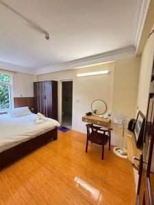 Postel nebo postele na pokoji v ubytování FIRONA FLY HOTEL