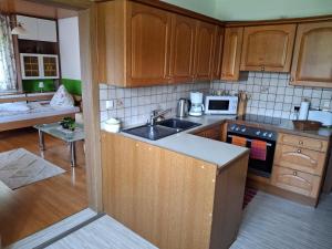 Kuchyň nebo kuchyňský kout v ubytování Maria's Ferienwohnung