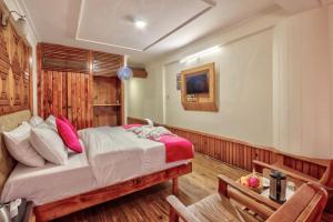 Letto o letti in una camera di Hotel Ibex