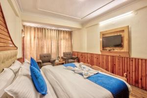 Letto o letti in una camera di Hotel Ibex