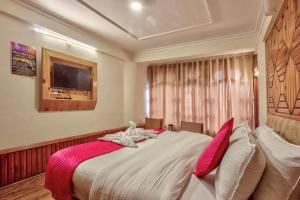 Letto o letti in una camera di Hotel Ibex