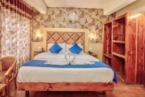 Letto o letti in una camera di Hotel Ibex