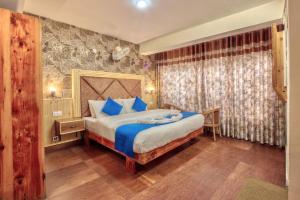 Letto o letti in una camera di Hotel Ibex