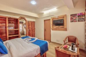 Letto o letti in una camera di Hotel Ibex