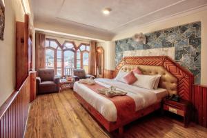 Letto o letti in una camera di Hotel Ibex
