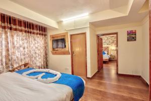 Letto o letti in una camera di Hotel Ibex