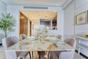 Predel za sedenje v nastanitvi FIRST CLASS 1BR Anantara The Palm Hotel