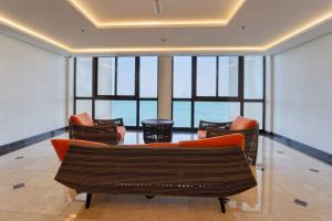 Predel za sedenje v nastanitvi FIRST CLASS 1BR Anantara The Palm Hotel