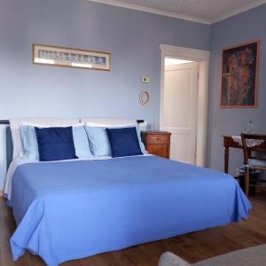 Postel nebo postele na pokoji v ubytování B&B OLTRA