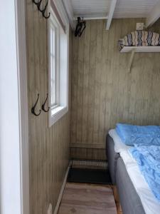 Postel nebo postele na pokoji v ubytování Klåveröd logi & café