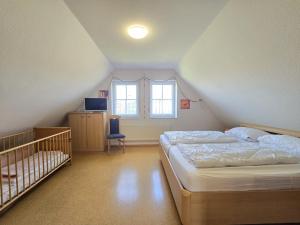 Ένα ή περισσότερα κρεβάτια σε δωμάτιο στο Ferienhaus Nenanie