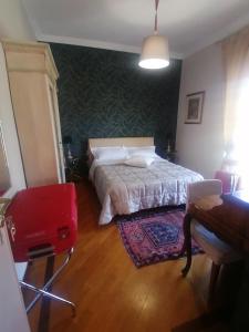 Posteľ alebo postele v izbe v ubytovaní B&B Buon Cammino Tuscia Viterbo - colazione inclusa - convenzionato con impianti termali