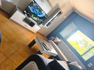 TV/trung tâm giải trí tại Casa Tani