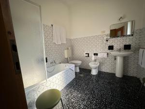 Koupelna v ubytování Albergo LA COLDRA + 9 fotografií