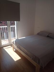 Postel nebo postele na pokoji v ubytování Apartaments Can Fabul