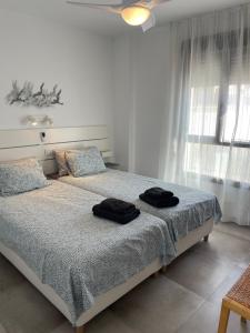 Posteľ alebo postele v izbe v ubytovaní Vista DIMAS 03 , Frigiliana