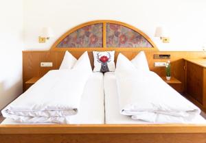 Postel nebo postele na pokoji v ubytování Hotel Schauinsland