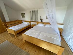Ένα ή περισσότερα κρεβάτια σε δωμάτιο στο Authentic House Pelegrinka