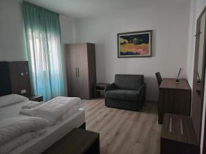 Voodi või voodid majutusasutuse Albergo Al Gambero toas