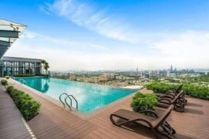a swimming pool on the roof of a building at Eko Cheras Duplex by DeUrban in Kuala Lumpur