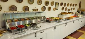 a buffet line with many different types of food at Ilinca in Neptun
