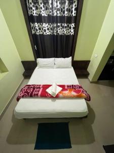 Ένα ή περισσότερα κρεβάτια σε δωμάτιο στο Casita Greens