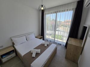Ένα ή περισσότερα κρεβάτια σε δωμάτιο στο Kyrenia Boutique Residance +42 φωτογραφίες