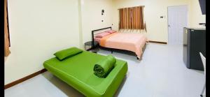Postel nebo postele na pokoji v ubytování Panutsaya Homestay + 37 fotografií