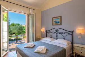 Postel nebo postele na pokoji v ubytování La Visciola - Country House del Conero + 37 fotografií