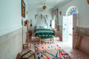 Postel nebo postele na pokoji v ubytování Riad Zayn & Spa + 37 fotografií