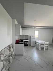 Cucina o angolo cottura di Suli Beach Apartments