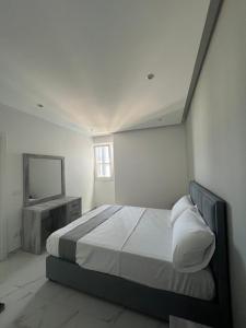 Letto o letti in una camera di Suli Beach Apartments