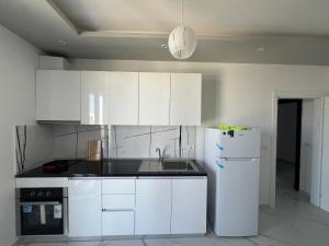 Cucina o angolo cottura di Suli Beach Apartments