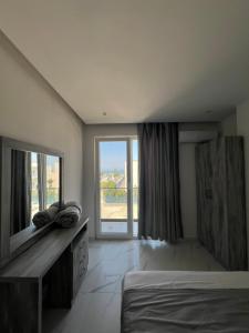 Letto o letti in una camera di Suli Beach Apartments