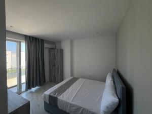 Letto o letti in una camera di Suli Beach Apartments