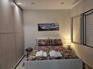 Guarantee to make you say wow! tesisinde bir odada yatak veya yataklar