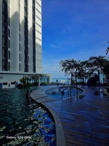 Πισίνα στο ή κοντά στο The Shore SeaView Center Kota Kinabalu Home Suites Studio