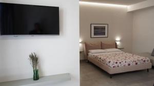 Postel nebo postele na pokoji v ubytování Vento e salsedine