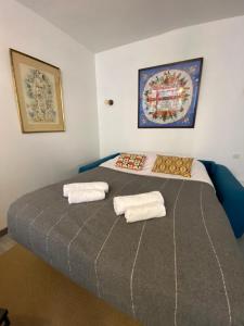 Ένα ή περισσότερα κρεβάτια σε δωμάτιο στο L'Adrien studio tout confort avec terrasse