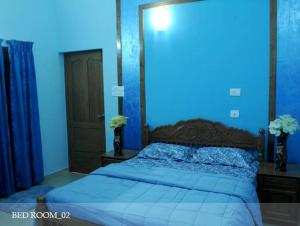 Postel nebo postele na pokoji v ubytování 6 Large Bedrooms house at kottayam town #812!983!5682 + 3 fotografie