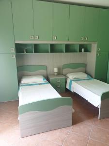 Katil atau katil-katil dalam bilik di Magnolia House