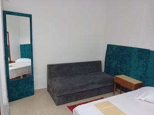 Una cama o camas en una habitación de Hotel Erimare