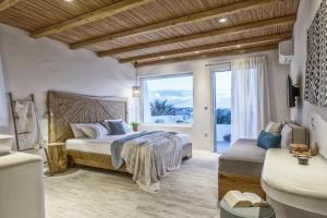 Postel nebo postele na pokoji v ubytování Orkos Beach Hotel + 37 fotografií