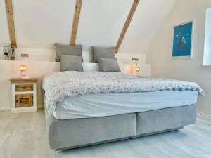 Posteľ alebo postele v izbe v ubytovaní StylishHomes NEST - A Cosy Adventure