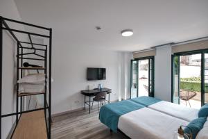 Postel nebo postele na pokoji v ubytování Hotel Pombal Rooms